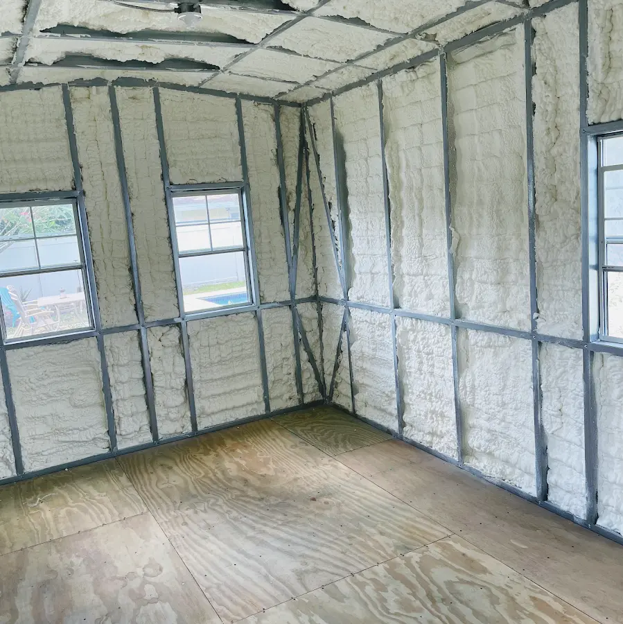 Closed-cell spray foam insulation applied to wall cavities in a residential project in Basehor